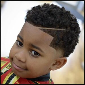 Young black boy with a waves hairstyle