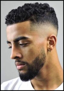  Mid-Bald Fade with Tight Curls
